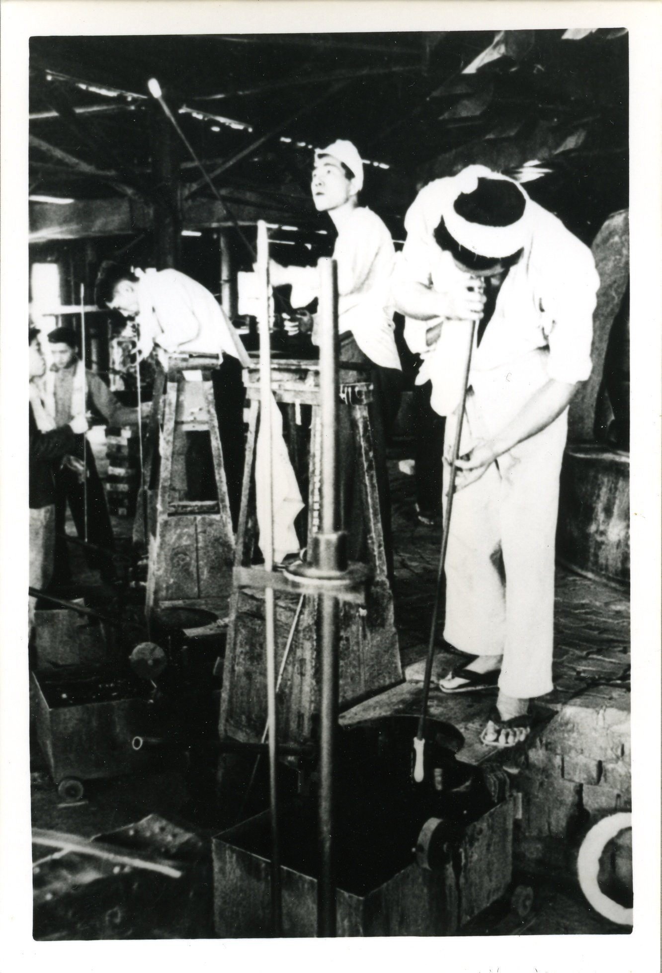 Hand-blowing scene of vacuum tubes and glass tubes
